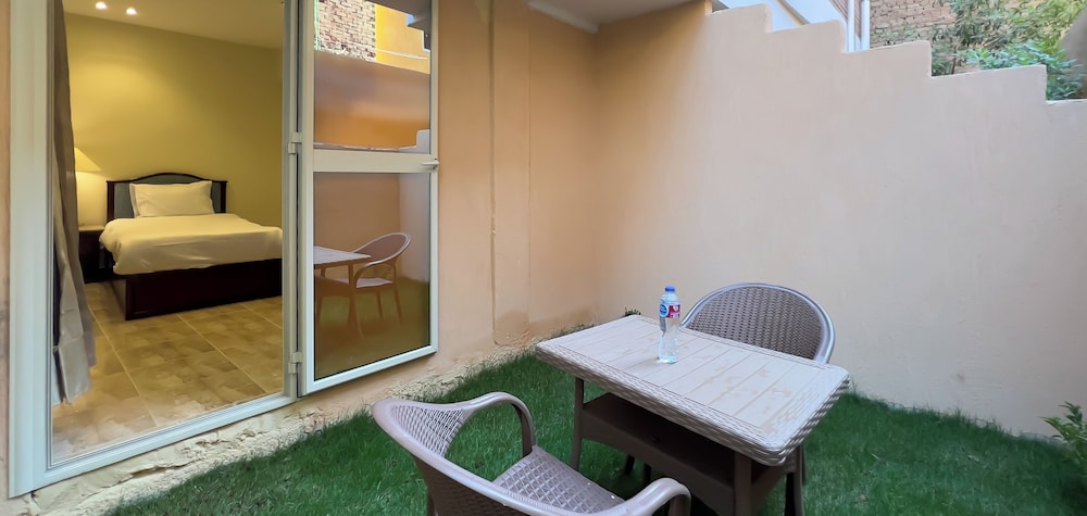 Family Quadruple Room, Garden Area photo 1