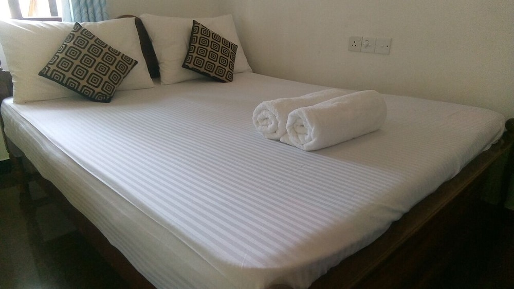 Deluxe Room, Multiple Bedrooms, Balcony, Garden View photo 2