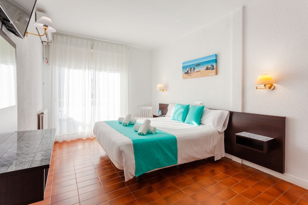 Habitación Doble Estándar o con Dos Camas Individuales.