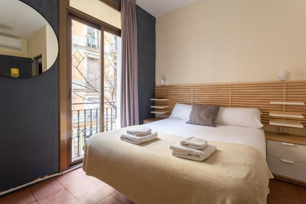 Habitación triple, balcón