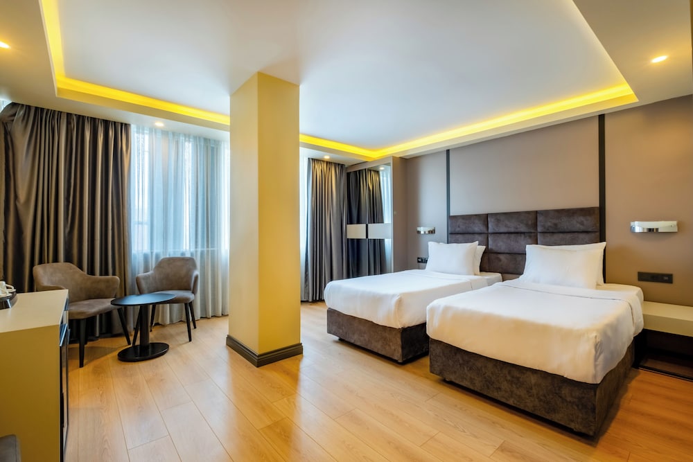 Standard Twin Room - Photo 4