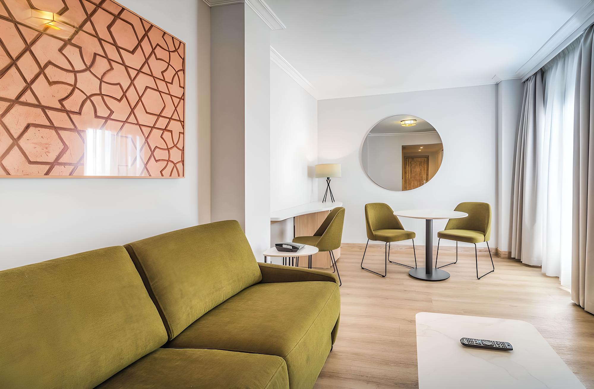 Relax in style and comfort in this inviting hotel room.