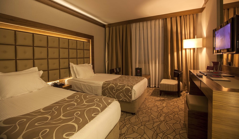 Grand Deluxe Triple Bedroom photo 2