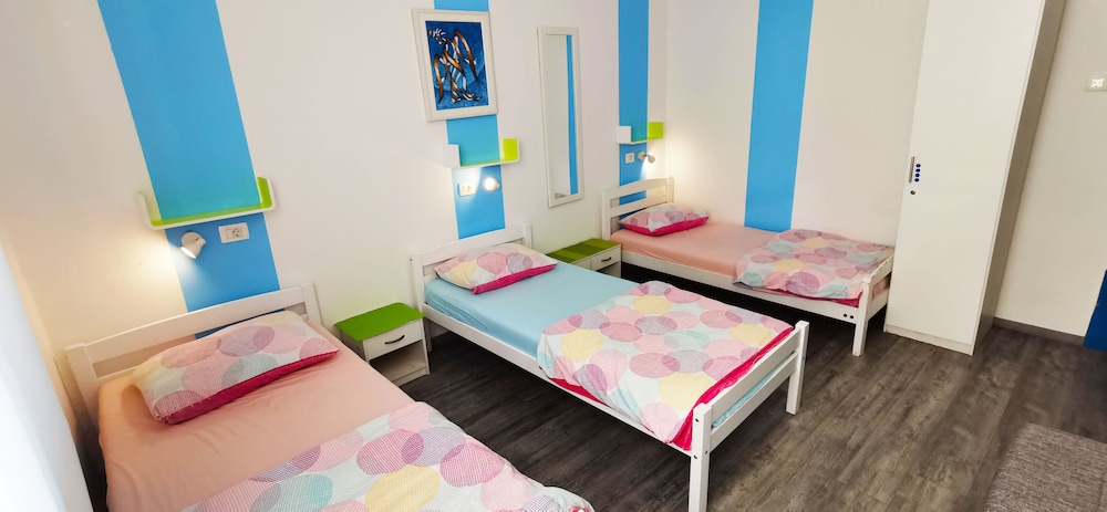 Triple Room, Non Smoking, Shared Bathroom