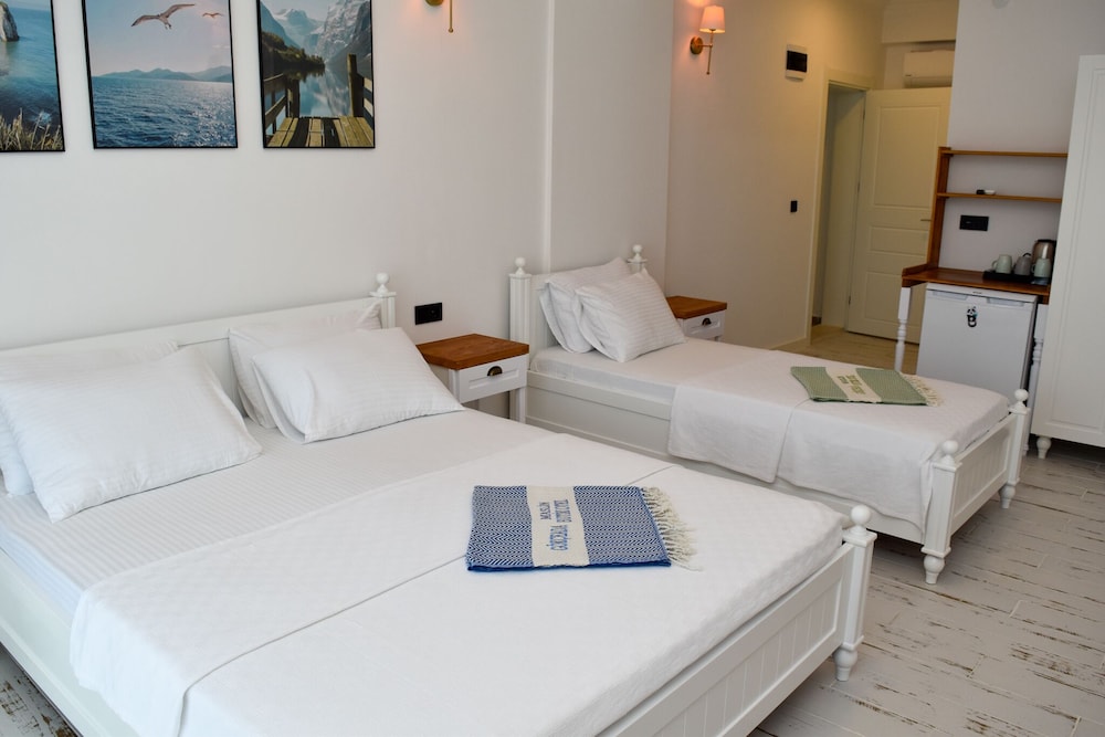 Deluxe Triple Room, Balcony, Sea View - Photo 16