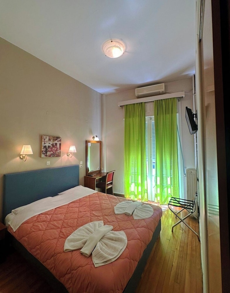 Chambre, plusieurs lits