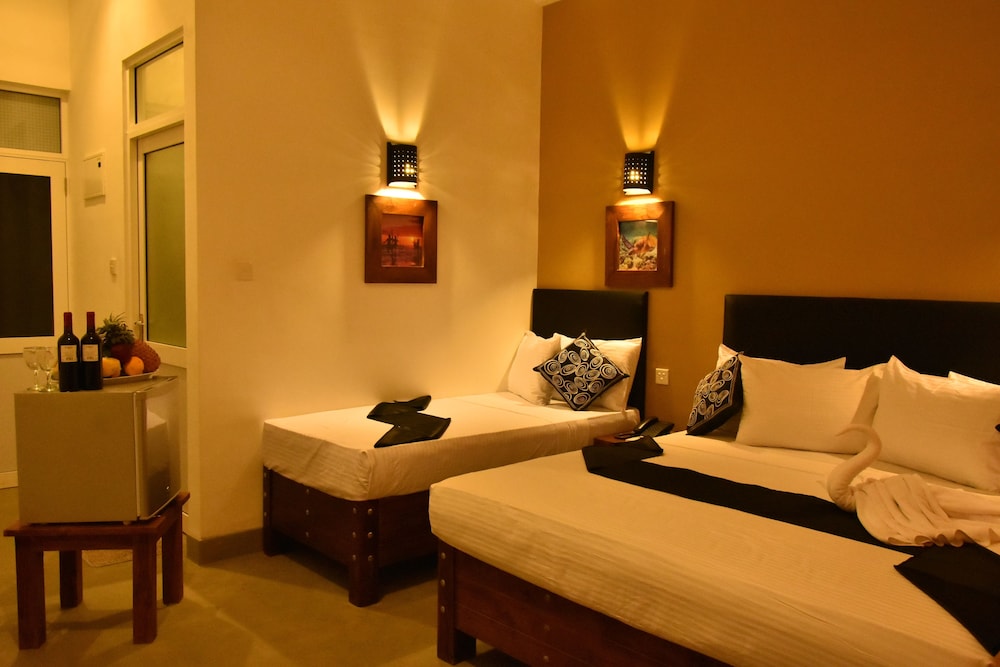 Deluxe Triple Room
