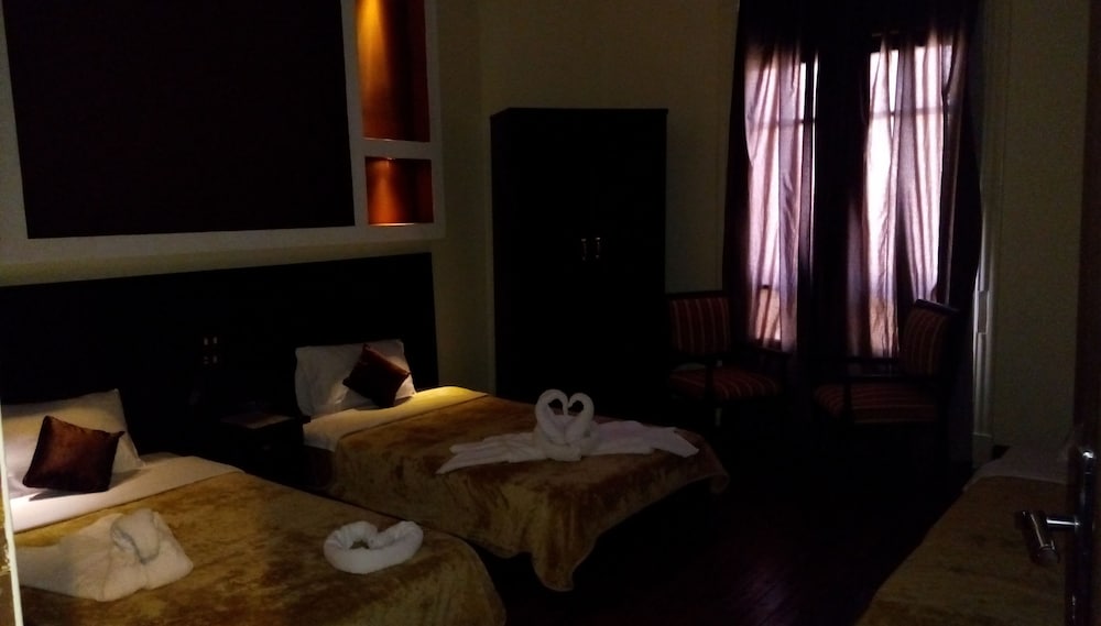 Deluxe Triple Room - Photo 1