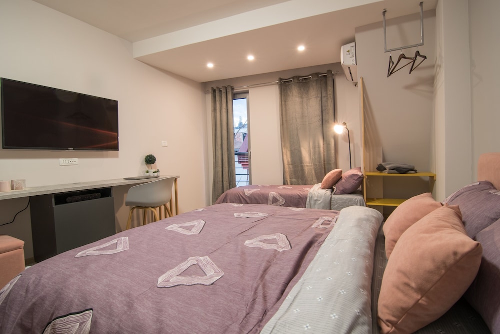 Deluxe Triple Room - Photo 10