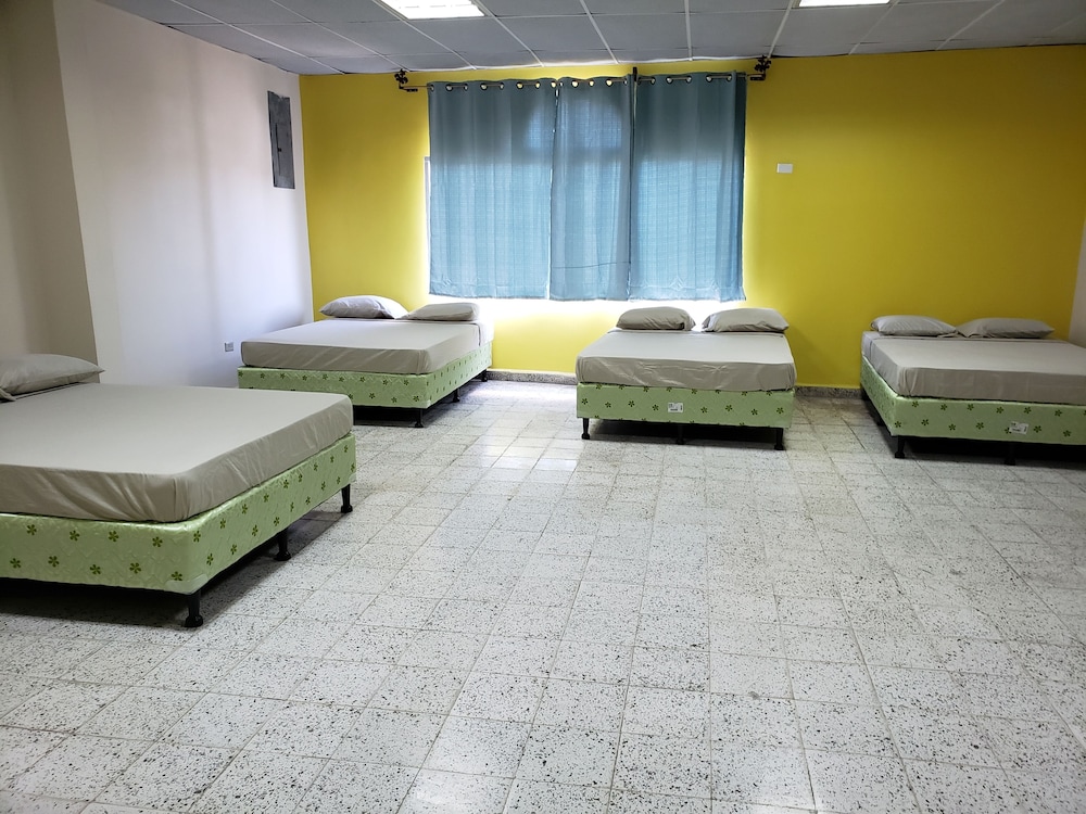 Basic Quadruple Room, Multiple Beds, Private Bathroom, Courtyard Area photo 2