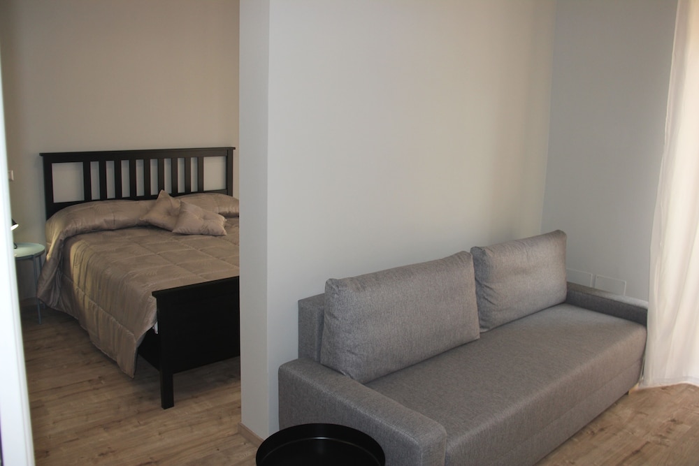 Comfort Room, 1 Queen Bed, Balcony, City View