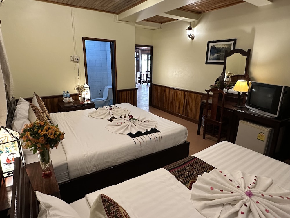 Deluxe Triple Room - Photo 11