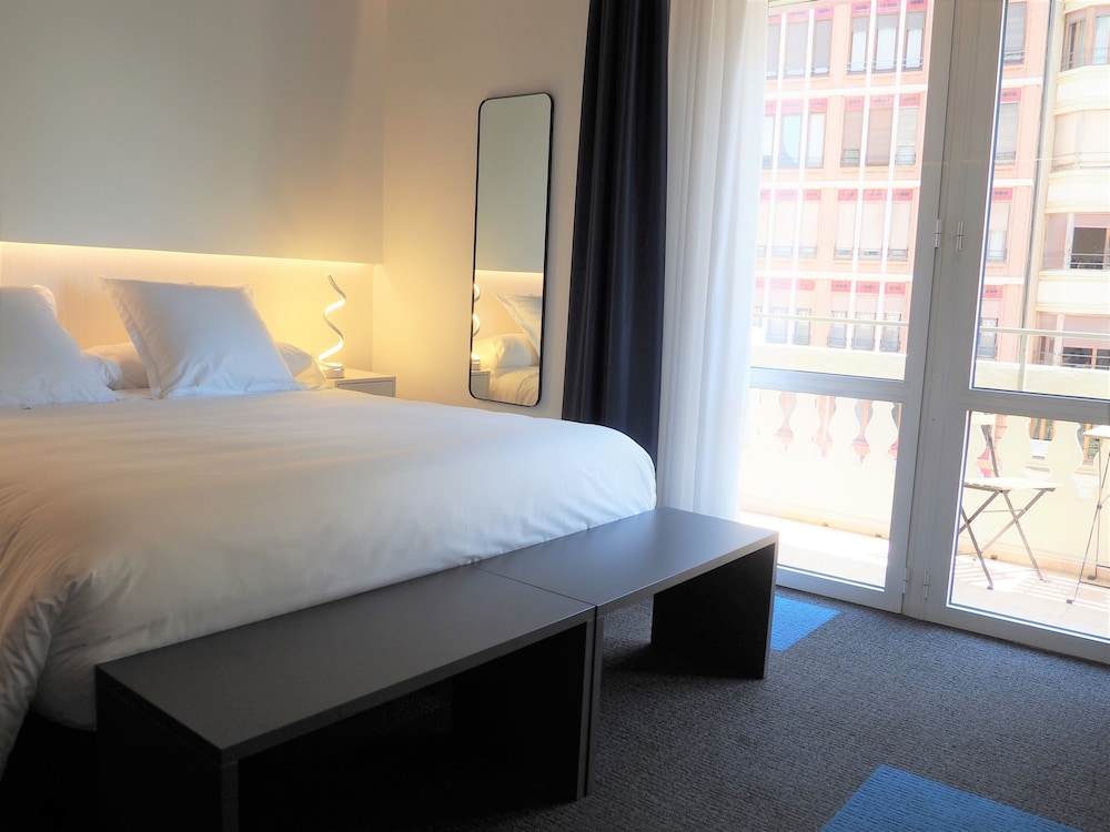 Habitación Doble Estándar o con Dos Camas Individuales.