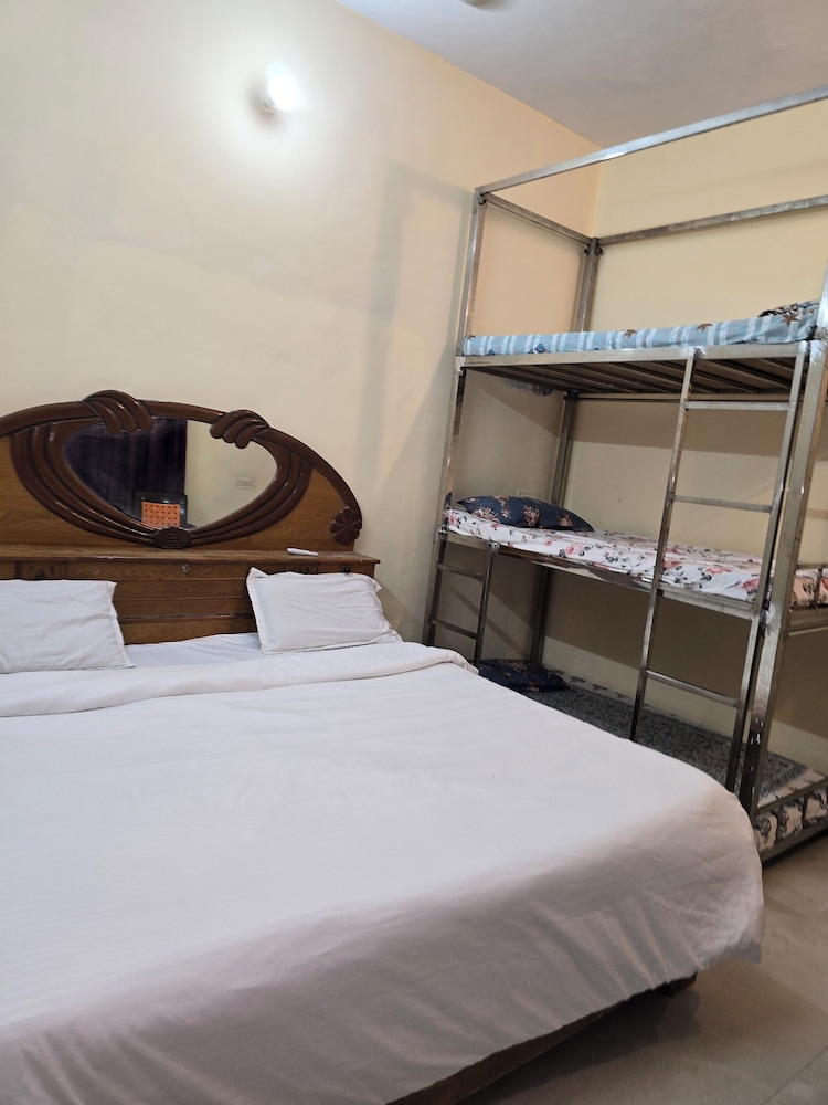Deluxe Quadruple Room, Multiple Beds, Air conditioning, Ground Floor