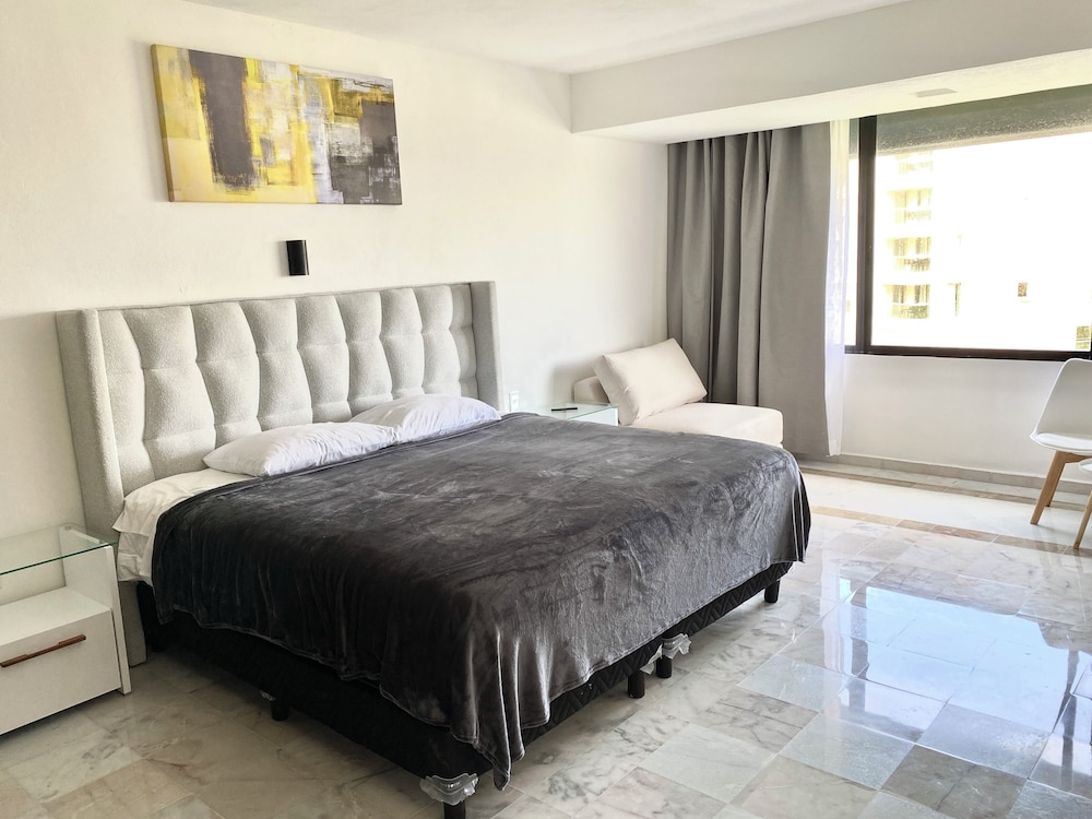 Deluxe Quadruple Room, 1 King Bed, Garden View, Beachfront