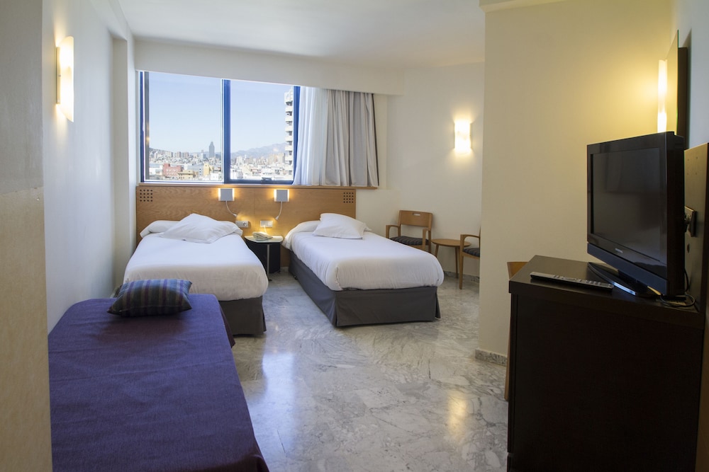 Triple Room (2 Adults + 1 Child)