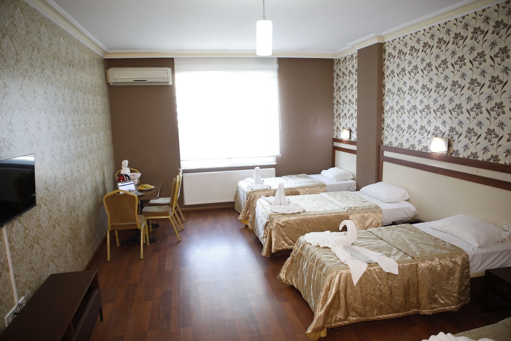 Deluxe Triple Room - Photo 14