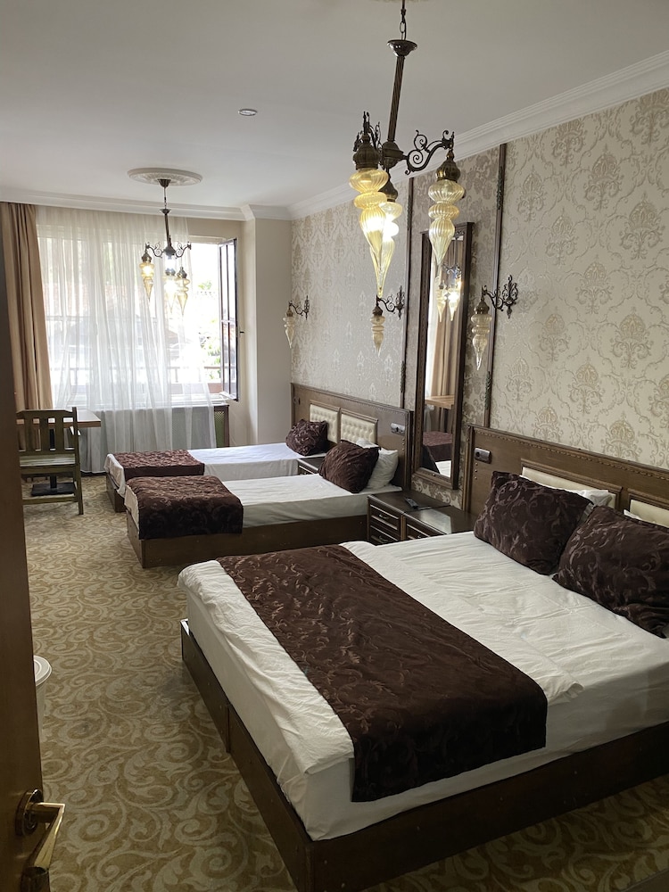 Standard Quadruple Room, Balcony, City View photo 1