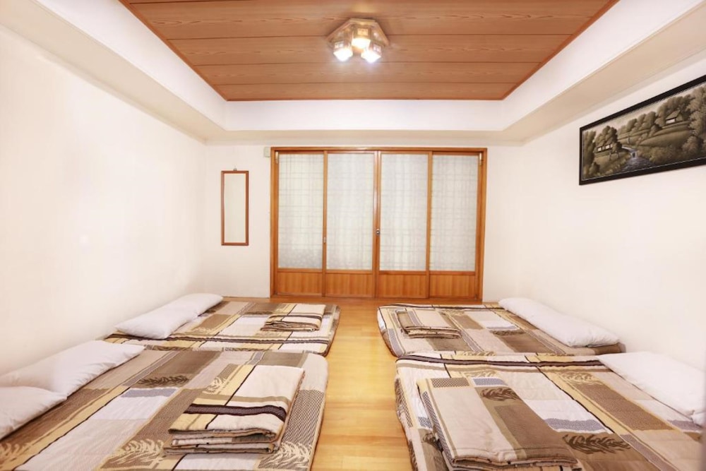 Quadruple room with shared bathroom