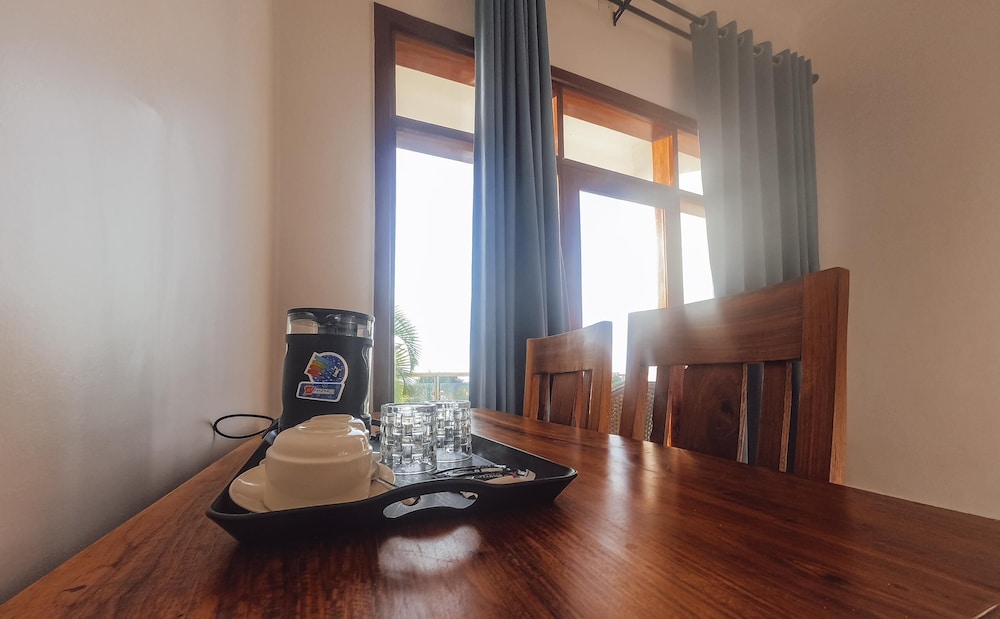 Deluxe Triple Room, Patio, Garden View