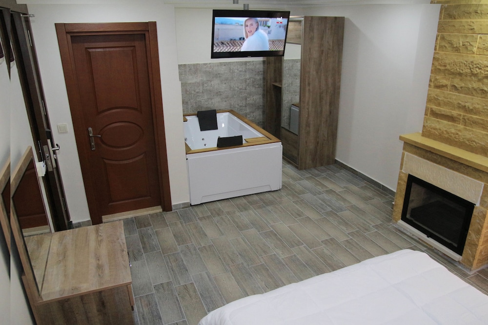 Suite with Jet Tub and Fireplace, Pool View photo 1