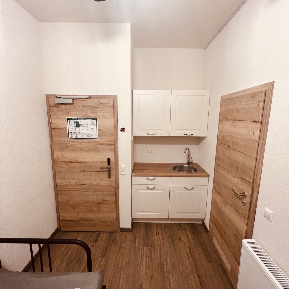 2-person room with private bathroom & kitchenette photo 2