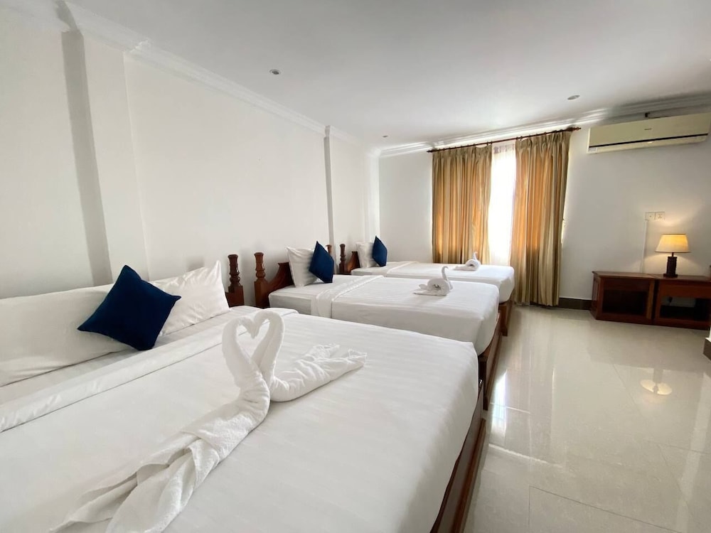 Deluxe Triple Room - Photo 2