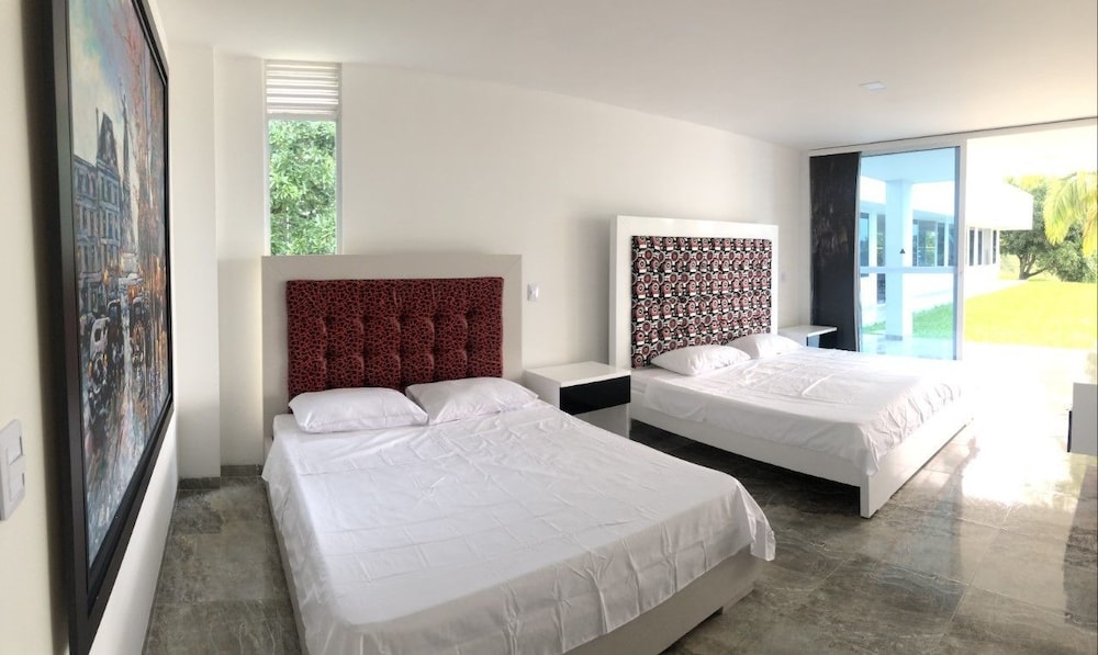 Deluxe Quadruple Room, Garden View