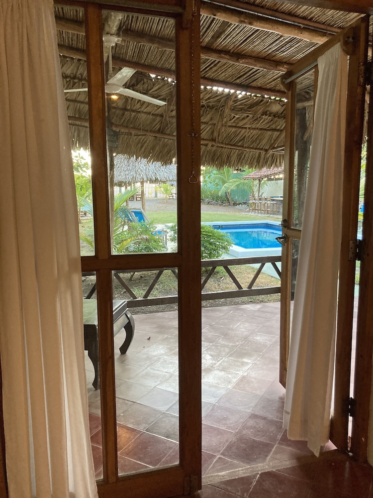 Deluxe Room, 1 King Bed, Patio, Pool View photo 3