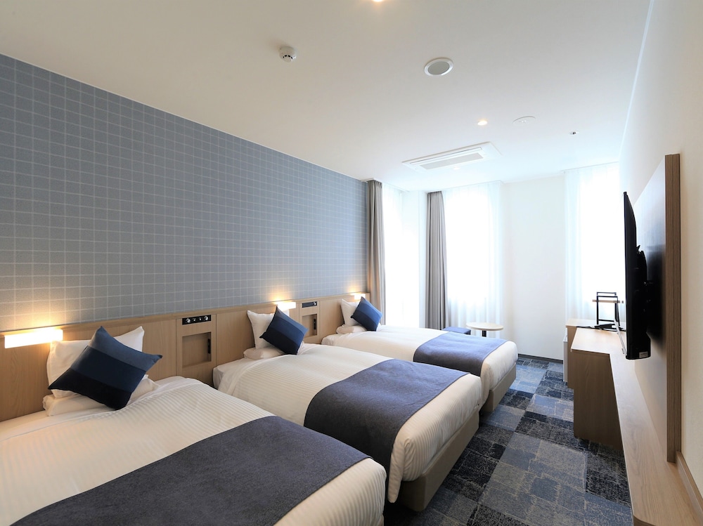 Deluxe Triple Room, Non Smoking (Eco Plan - No Housekeeping)
