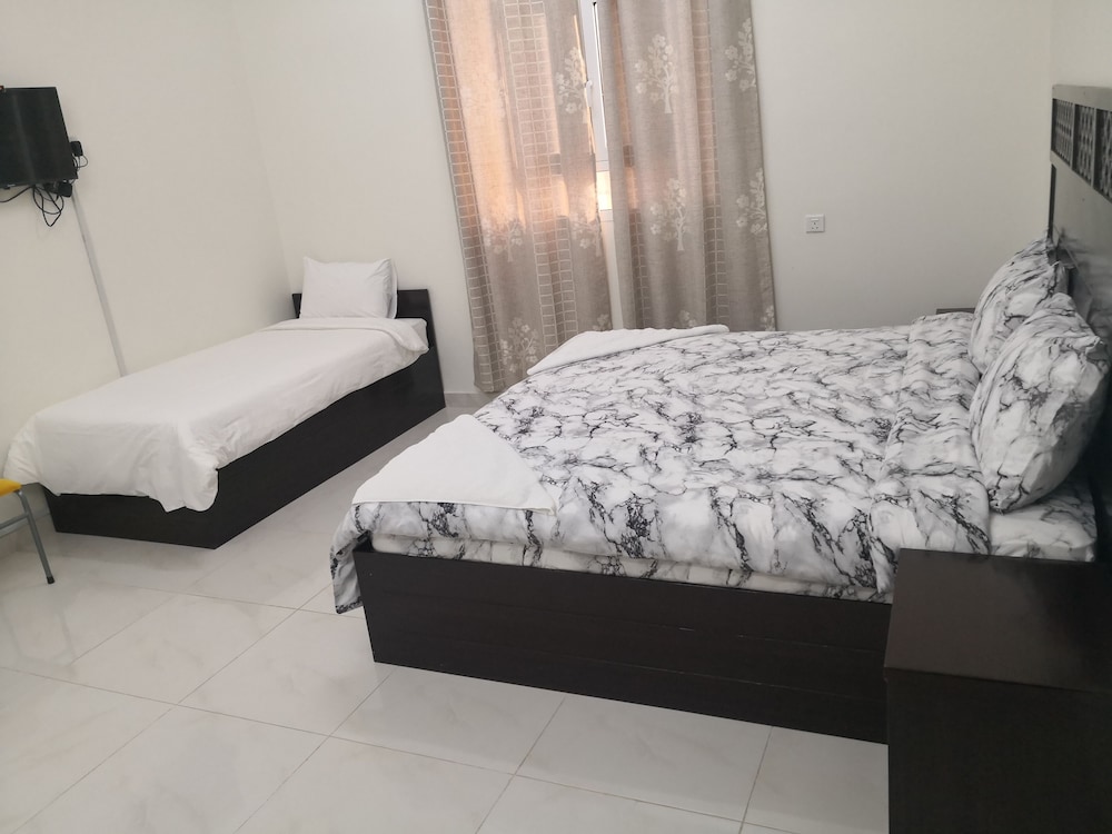 Standard Quadruple Room, Multiple Beds, Non Smoking, Courtyard View photo 3