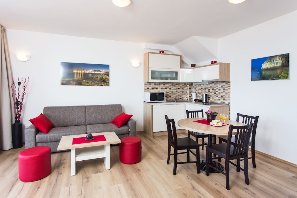 One-Bedroom Apartment with Balcony and Partial Sea View