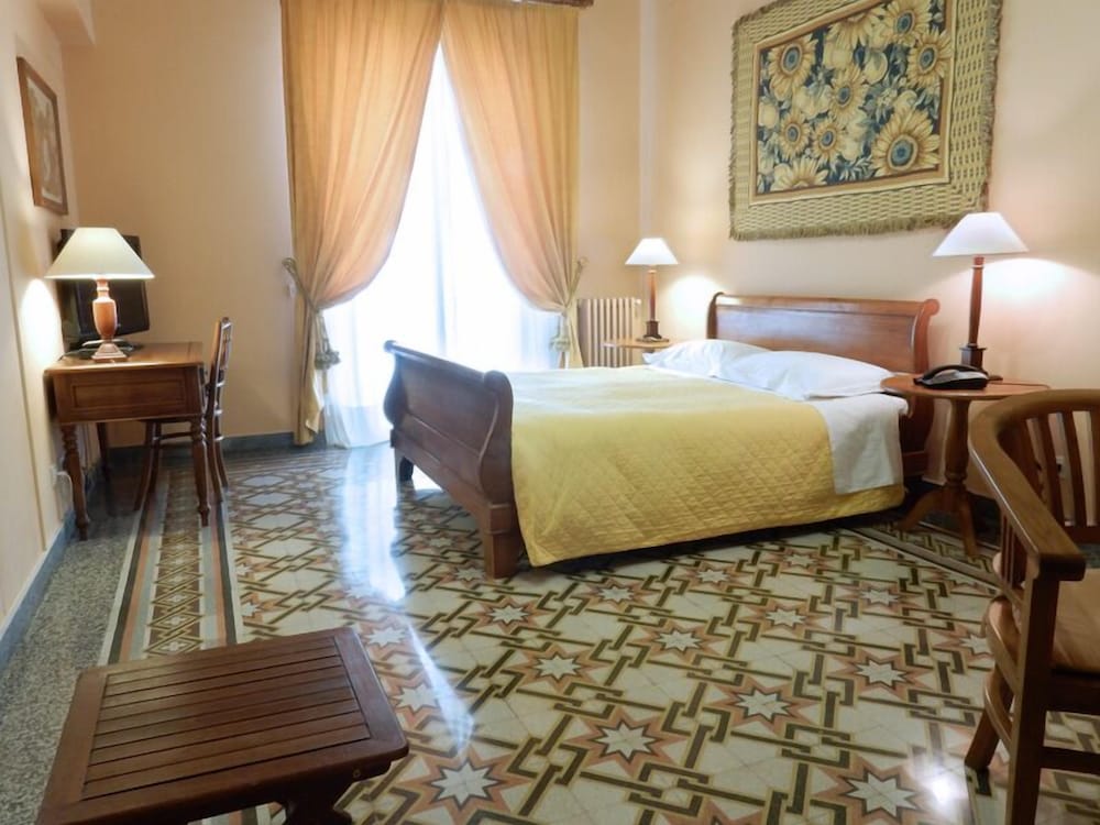 Quadruple Room - Photo 1