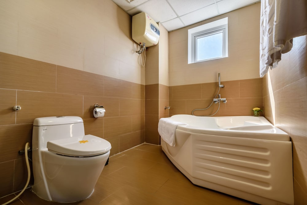 Deluxe Triple Room - Photo 11