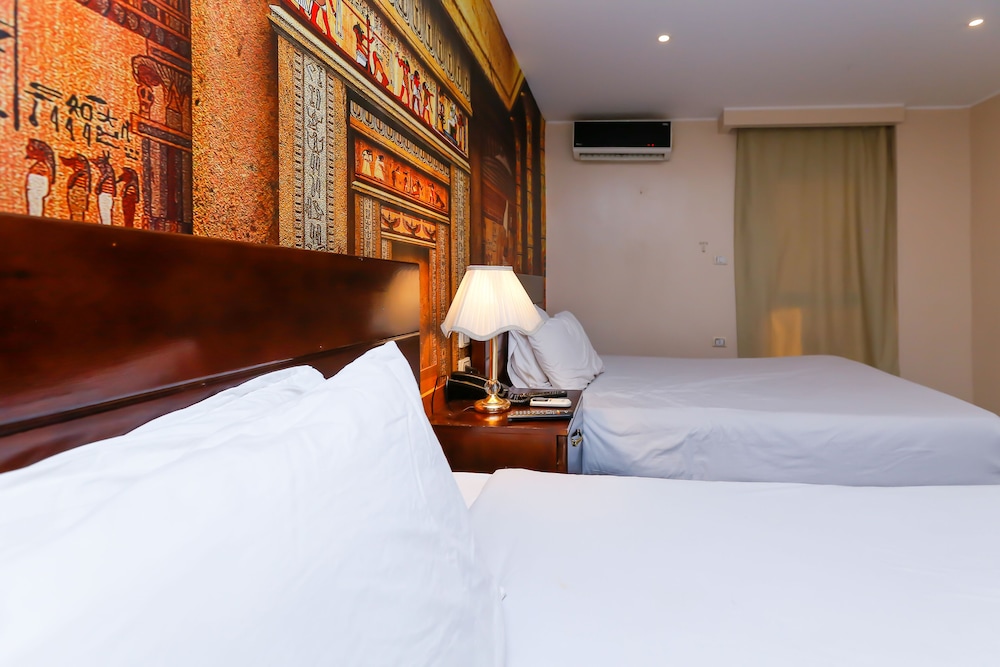 Deluxe Quadruple Room, 2 Double Beds, Balcony, City View