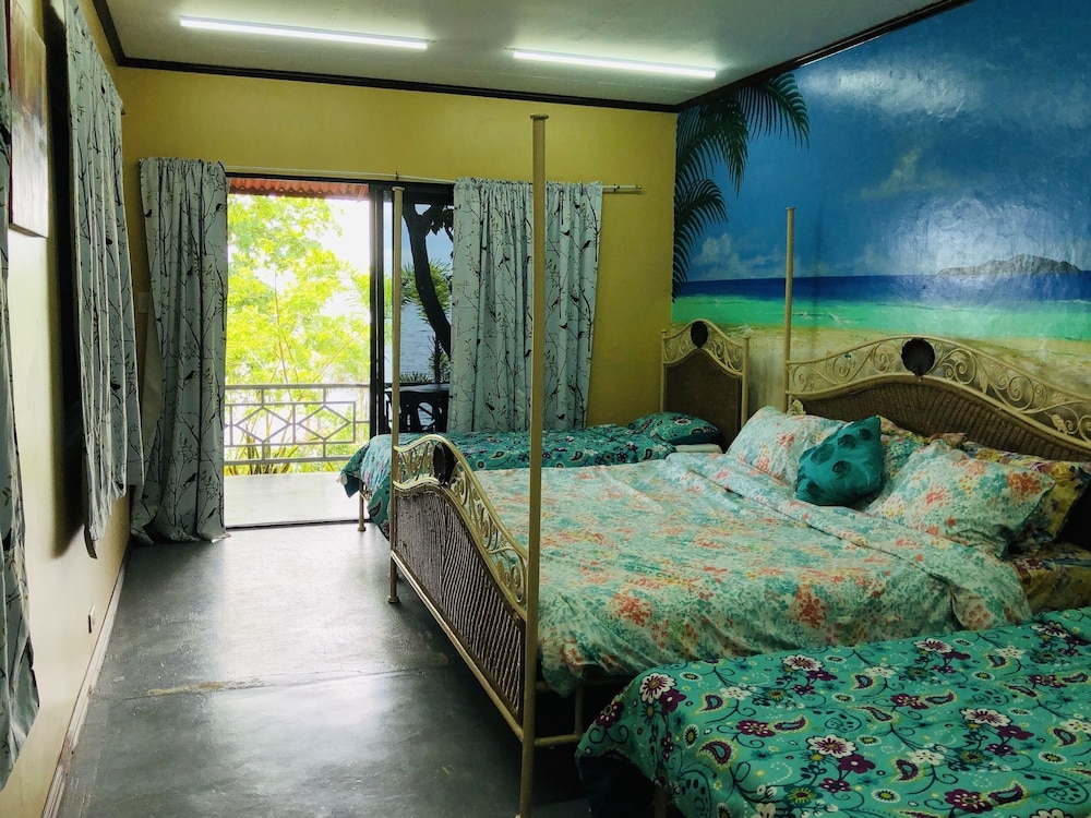 Deluxe Quadruple Room, 2 Double Beds, Non Smoking, Sea View photo 3