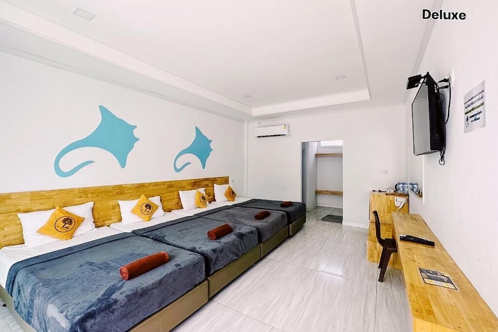 Deluxe Quad Room 4 Single Beds