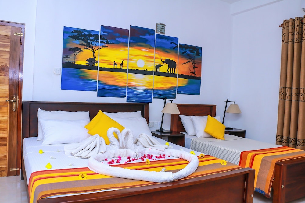 Deluxe Triple Room, City View photo 2