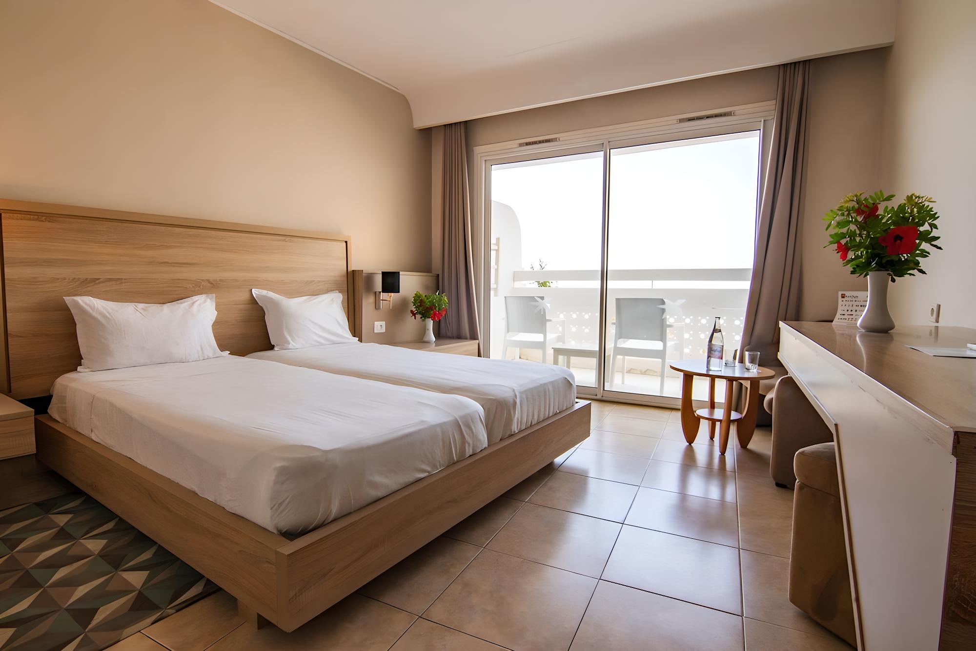 Relax in our cozy, stylish hotel room retreat.