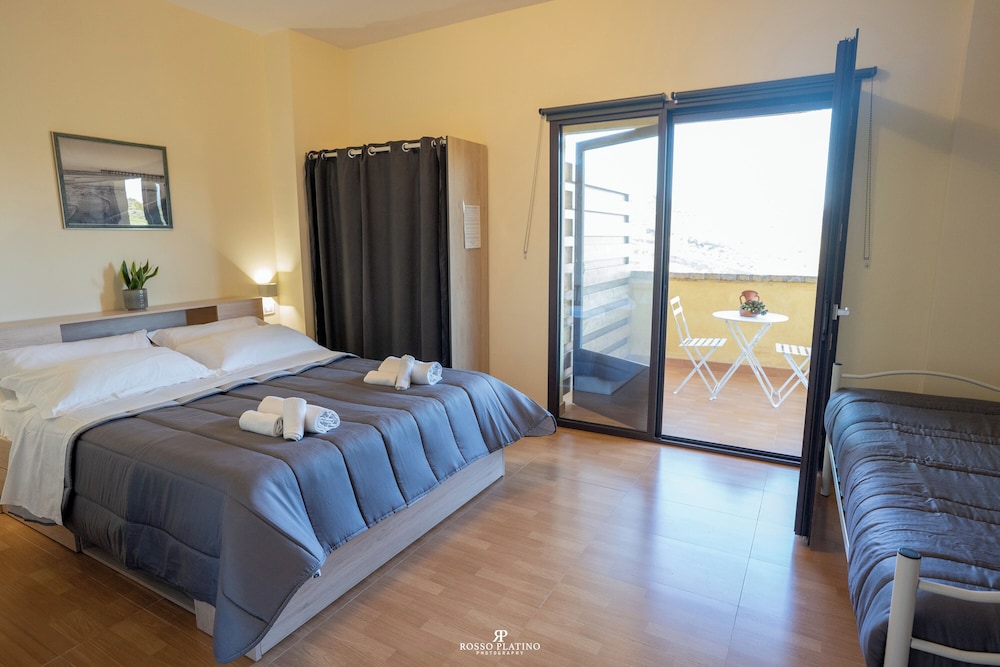 Deluxe Triple Room, Balcony, Beach View