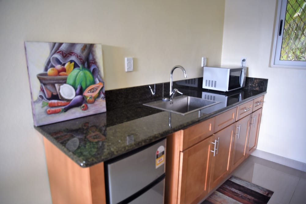 Deluxe Quadruple Room, 2 Queen Beds, Kitchen, Mountain View photo 2