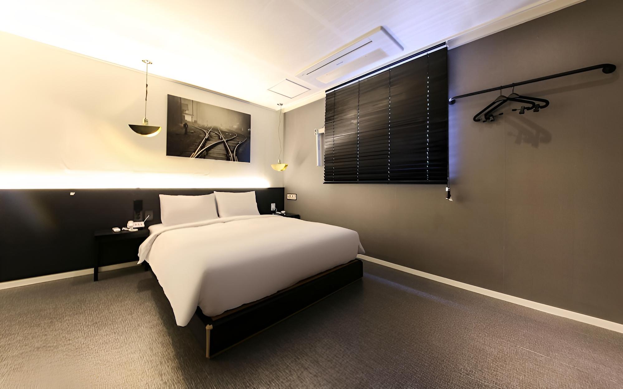 Room (Family Room A (bidet/hotel bedding/hi) - Photo 5