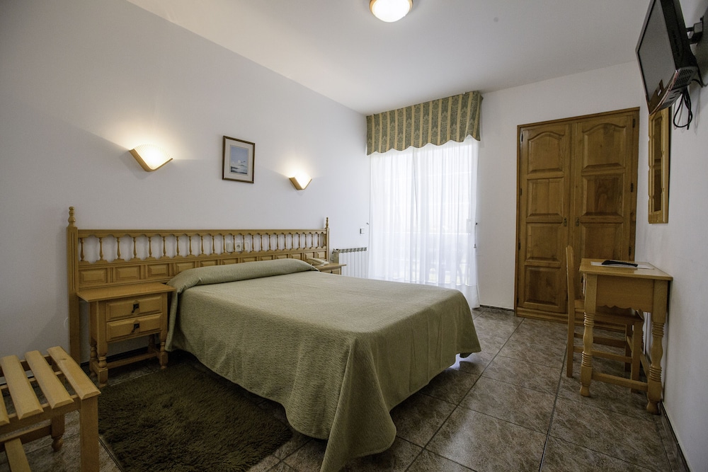 Habitación Doble Estándar o con Dos Camas Individuales.