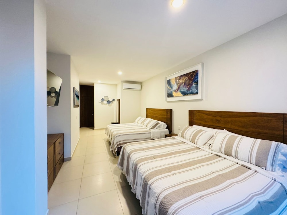 Deluxe Quadruple Room, Balcony, City View photo 1