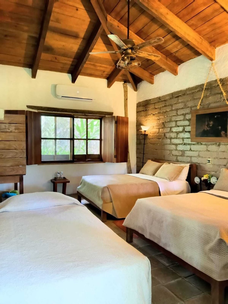 Deluxe Triple Room, Multiple Beds, Garden View