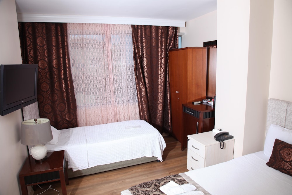 Deluxe Triple Room, Multiple Beds, Non Smoking, City View photo 1