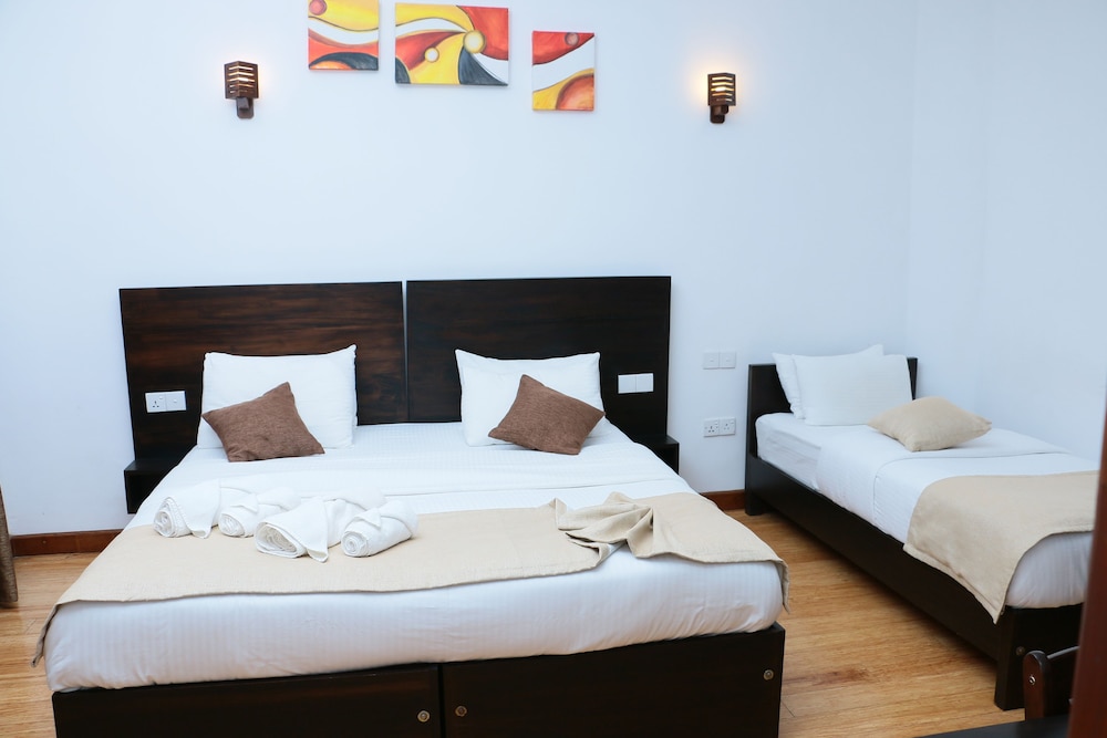 Deluxe Triple Room