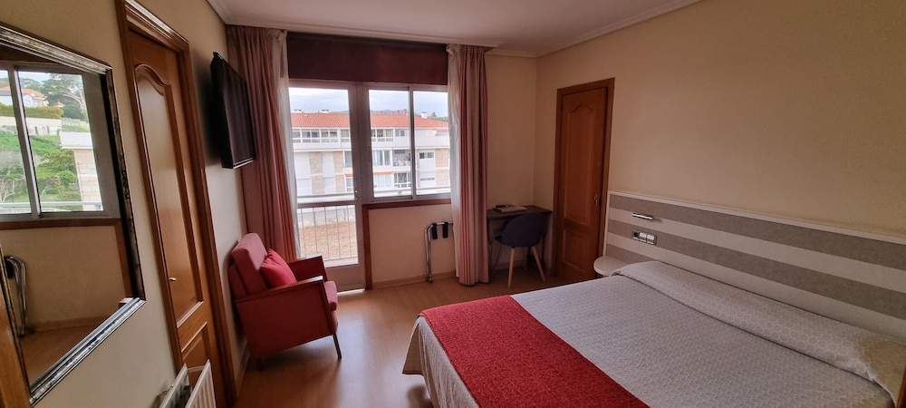 Habitación Doble Estándar o con Dos Camas Individuales.