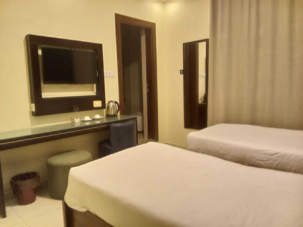Deluxe Quadruple Room - Photo 7