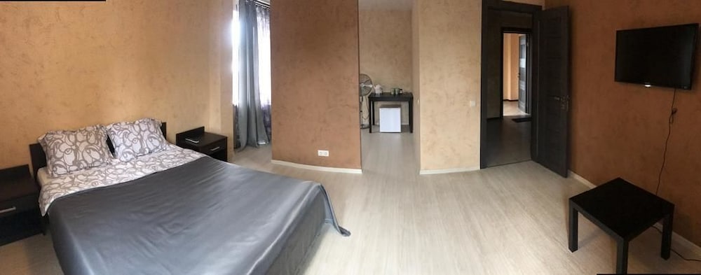 Family Quadruple Room, Multiple Beds, Refrigerator & Microwave, Courtyard Area photo 1